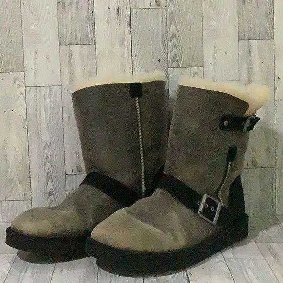 - Ugg women’s black side buckles distressed warm fuzzy winter boots size 8