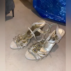Adrianna Papell Gold Heels with Shimmering Straps