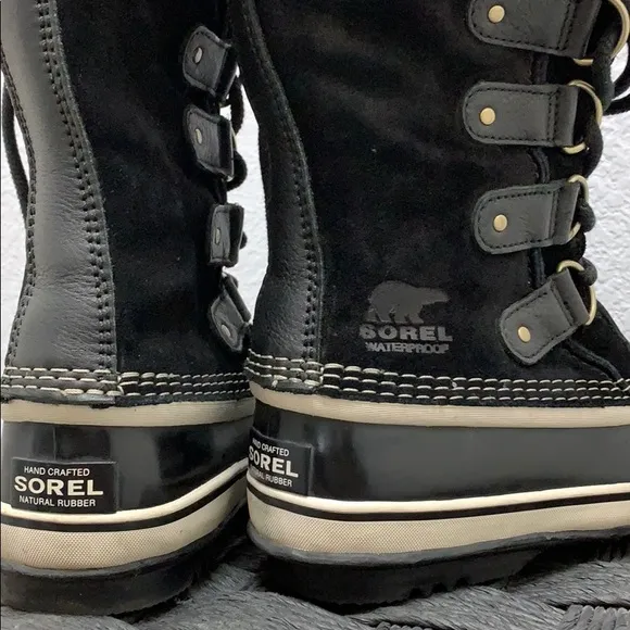 Black furry SOREL winter boots