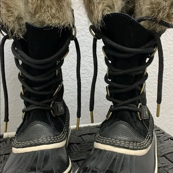 Black furry SOREL winter boots