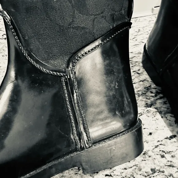 Coach Tristee black lace up rain boots size 8.