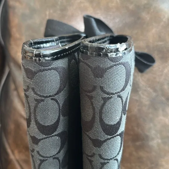 Coach Tristee black lace up rain boots size 8.