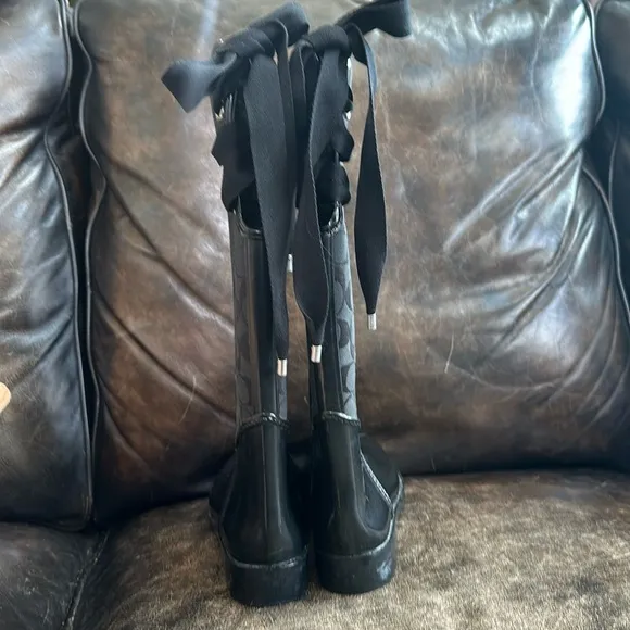 Coach Tristee black lace up rain boots size 8.