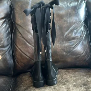 Coach Tristee black lace up rain boots size 8.