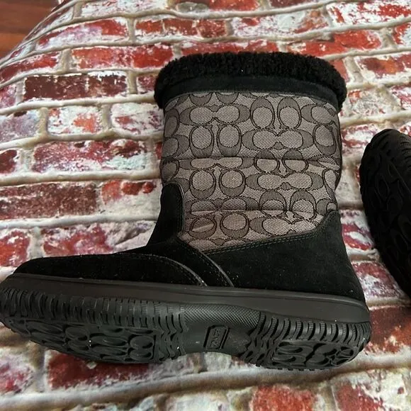 Coach brand black winter boots with CC print