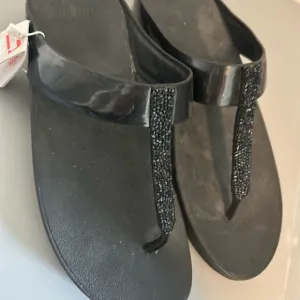 Fitflop Black Sandals with T-Strap Design