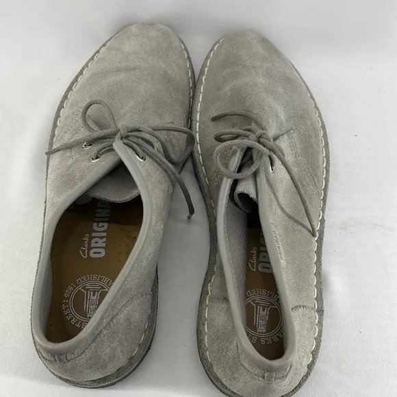 Grey suede loafers with cool turquoise/blue rubber soles