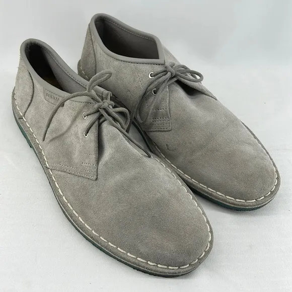 Grey suede loafers with cool turquoise/blue rubber soles