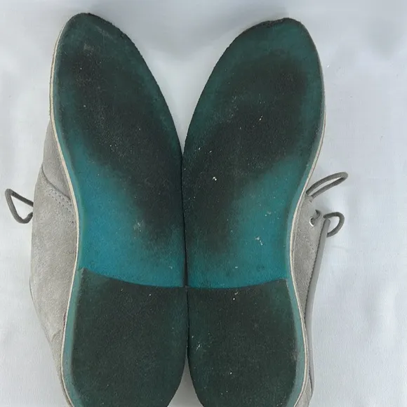 Grey suede loafers with cool turquoise/blue rubber soles
