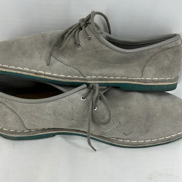Grey suede loafers with cool turquoise/blue rubber soles