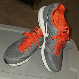 (J4) Nike Gray and Orange Athletic Shoes