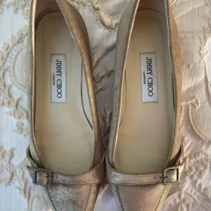 Jimmy Choo SZ 37 | US 6.5 Brushed Antique Gold Ballet Flats
