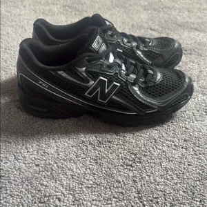 New Balance Black Athletic Shoes