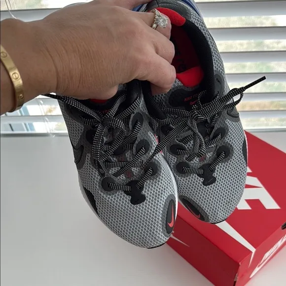 Nike Athletic Shoes with Red and Blue Soles