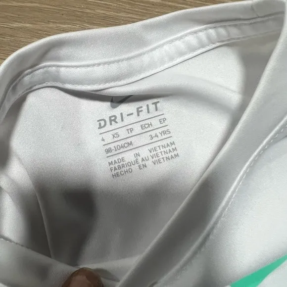 Nike Kids' White Top and Teal Shorts Set with Sneakers