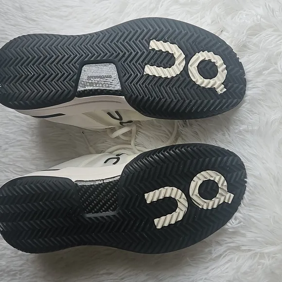O N On Running Men's White and Black Sneakers