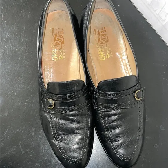 Salvatore Ferragamo's black leather loafers.