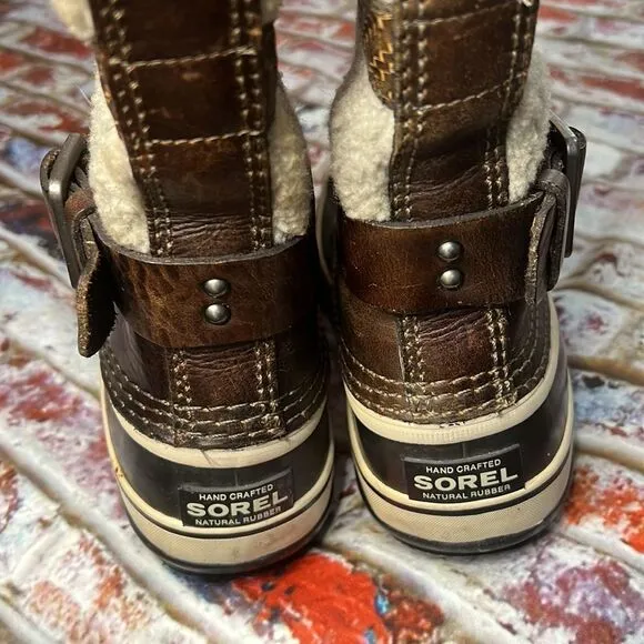 Sorel brown, curly lame and rubber winter boots tall