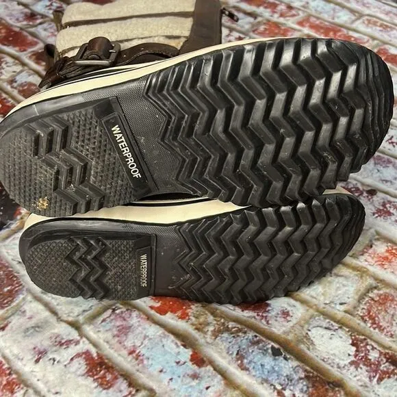 Sorel brown, curly lame and rubber winter boots tall