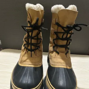 Sorel Tan and Black Winter Boots
