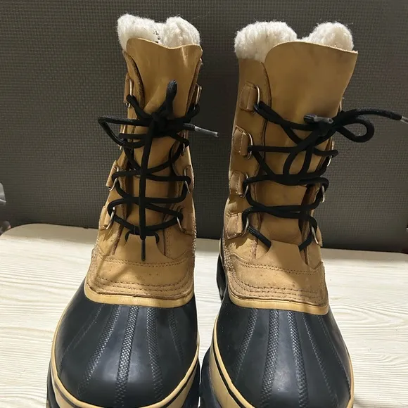Sorel Tan and Black Winter Boots