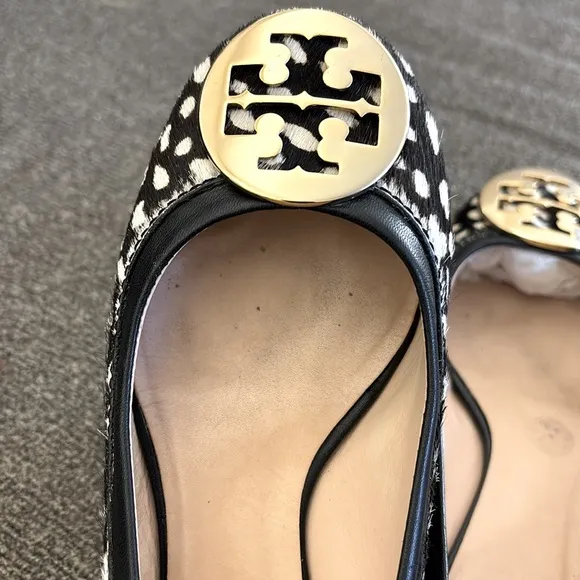 Tori Burch Reva Black/WhiteSpotted Calf Hair Gold Logo SlipOn Ballet Flats
